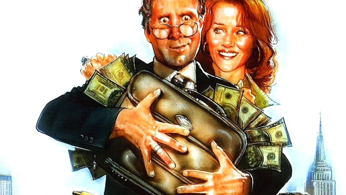 мужчина и женщина держат портфель с деньгами